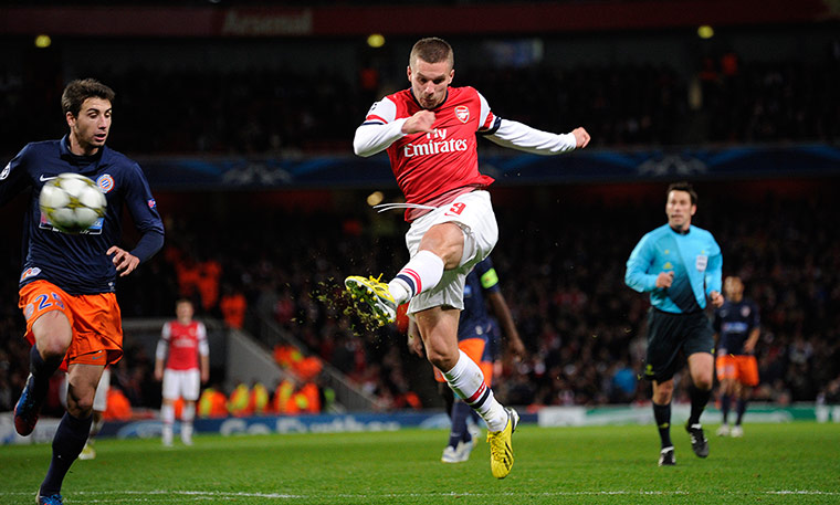 qualifiers: Lucas Podolski volleys Arsenal's second goal