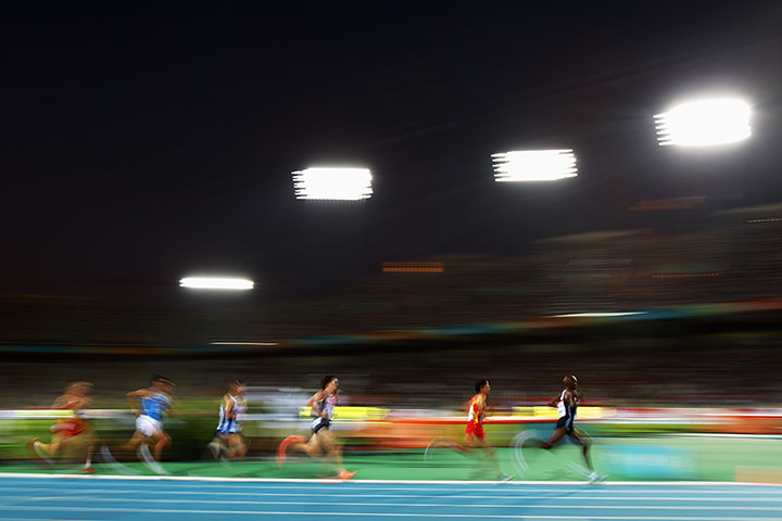 Mo Farah - In Pictures: Blurred image of Mo Farah leading field of runners