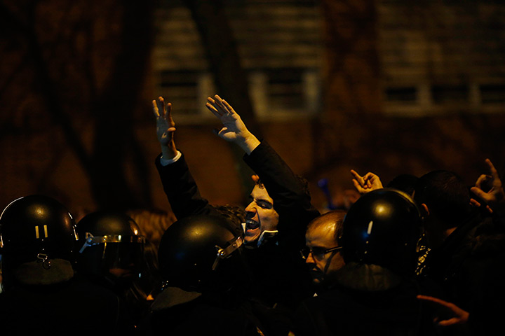 24 hours in pictures: Demonstrators are pushed back by Spanish riot police