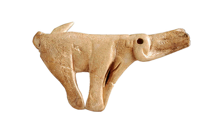 Ice age artifacts: A spear-thrower carved into the shape of a mammoth