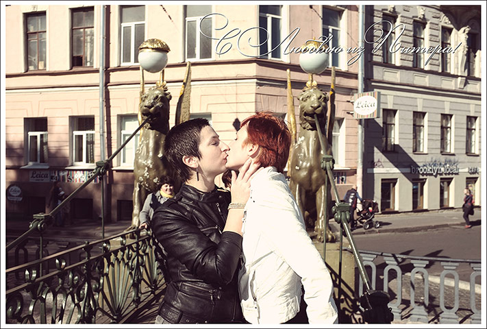 Big picture: Gay Russians: Same-sex couple kissing outside a Russian landmark in a style of a postcard