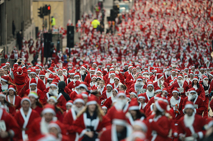 24 hours: Glasgow, Scotland: A thousand people take part in the annual Santa Dash