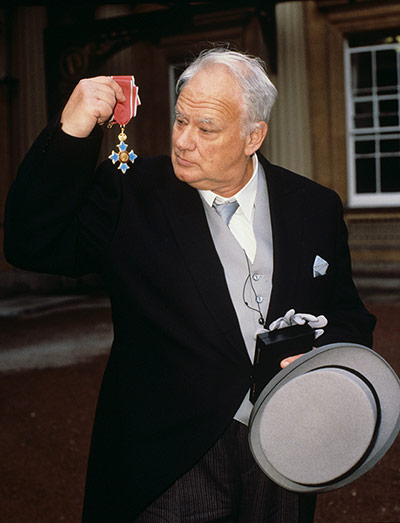 Patrick Moore collects his CBE at Buckingham Palace in October 1988