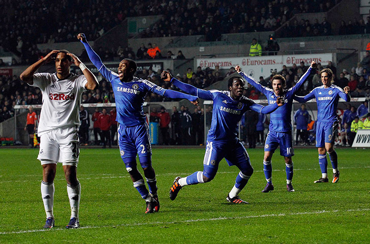 Tuesday Prem: Chelsea's players celebrate after Bosingwa scored a goal against Swansea