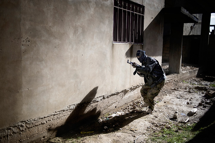 Al-Qusayr Syria: A member of the Free Syrian Army during an attack operation 