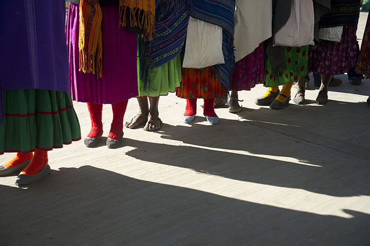 Drought in Mexico: Raramuris women stay on line while waiting to recive medical assitence