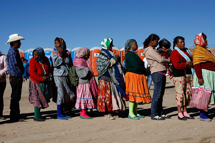 Drought in Mexico: Tarahumara Indians stand in line to receive a government donation of food