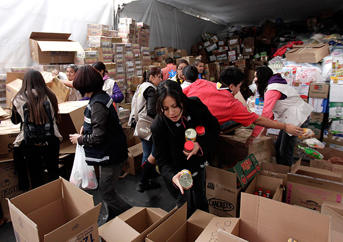 Drought in Mexico: City workers and volunteers sort food donated to Tarahumara Indians 