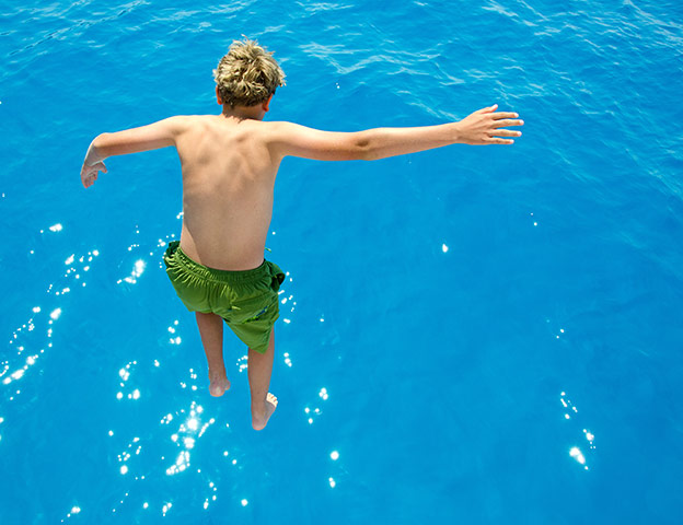 In pictures: splash: boy jumping in sea