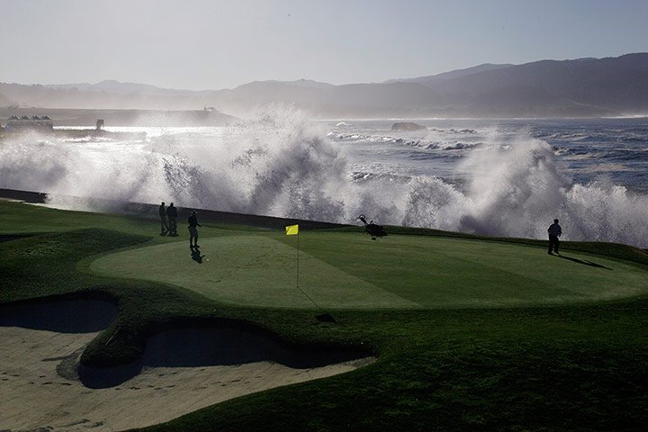 best of the week: Waves crash over the seawall on the 18th hole at Pebble Beach