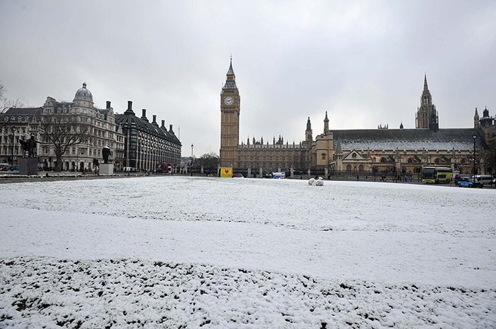 Snow: Snow covers the ground in Parliament Square in London