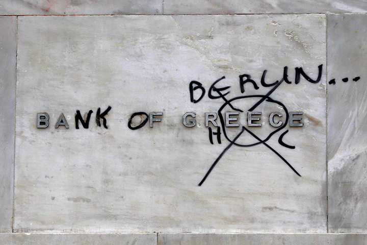 Greece protests: A defaced Bank of Greece sign