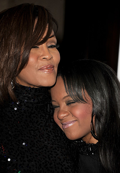 Whitney Houston obit: Whitney Houston and Bobbi Kristina arrive at the 2011 Pre-GRAMMY Gala