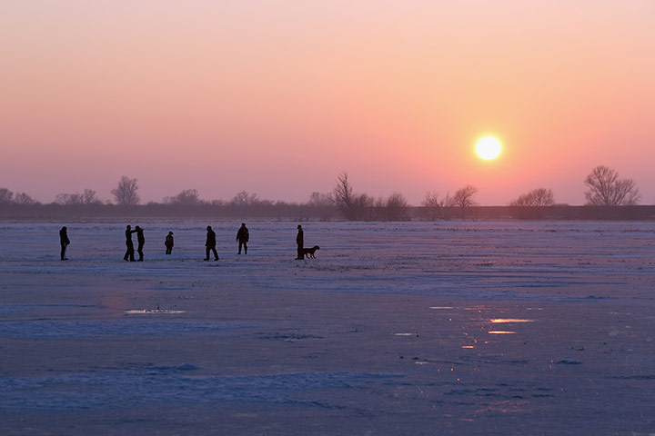 UK weather: Enthusiasts Attempt To Skate On The Frozen Fens