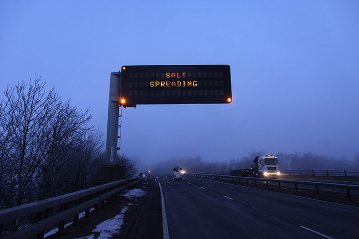 UK weather: A road sign informs motorists that salt is being spread in Huntingdon