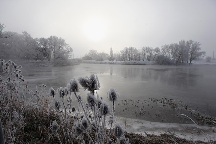 UK weather: The sun rises over a frost-covered scene 