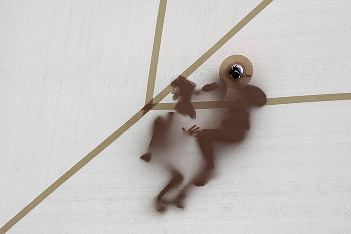 24 hours in pictures: Photographer takes a picture through the roof of the Carrier Dome, Syracuse