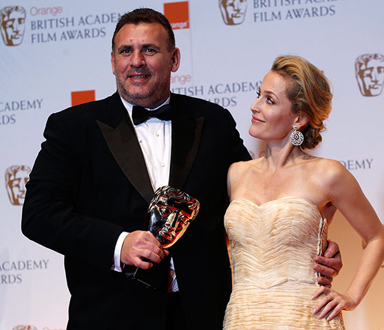 Baftas 2012 winners: Anderson poses with King