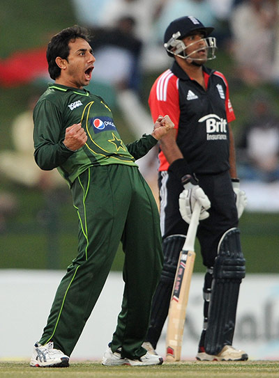 1st ODI: Saeed Ajmal of Pakistan celebrates taking dismissing England's Stuart Broad