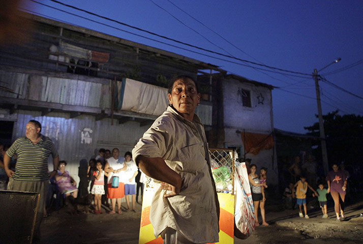 24 hours: Asuncion, Paraguay: Residents watch as homes burn in Chacarita slum