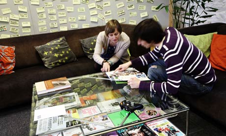 people sharing ideas at a table