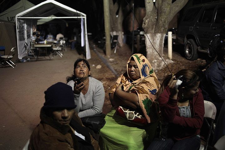 Honduras jail: Family members of the inmates wait outside the morgue for news