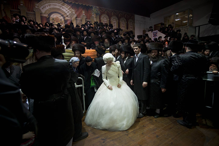 Jewish wedding: Ultra-Orthodox Jewish bride Nechama Paarel Horowitz enters the men section