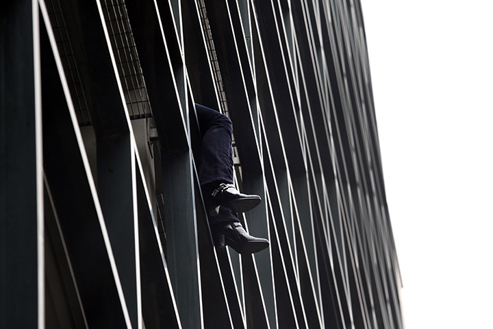 24 hours: Athens, Greece: A woman threatens to jump off a building