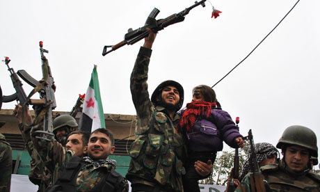 Syrian army defectors join anti-regime protesters in Homs province, January 2012