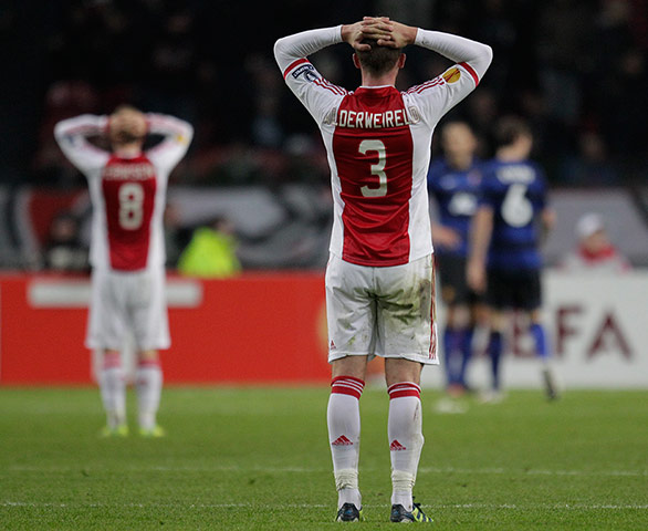 United: Ajax's Christian Eriksen and Toby Alderweirel look dejected