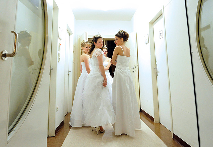 Vienna Opera Ball: Young debutantes wait before the opening of the ball
