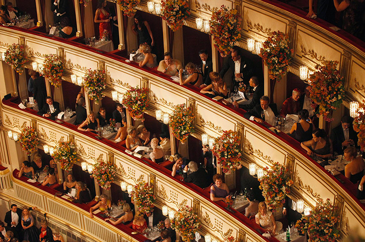 Vienna Opera Ball: People sit in their boxes during the ball
