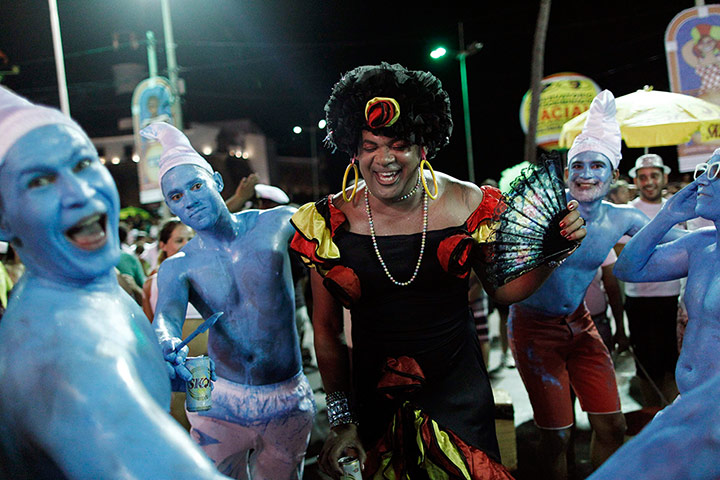Rio Carnival: Revelers smile at a masquerade party 