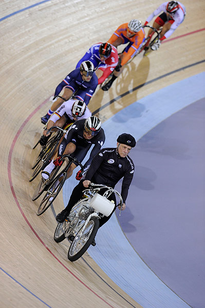 cycling saturday: The six competitors in the Mens kierin final are paced by the derny