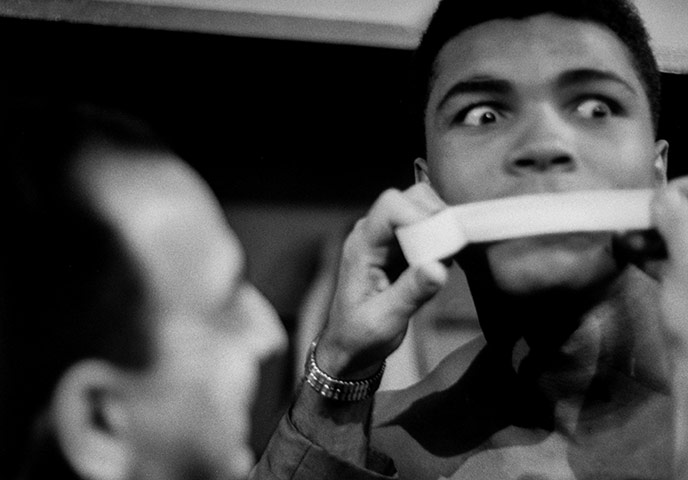 Angelo Dundee: Muhammad Ali, getting his poetic mouth taped by trainer Angelo Dundee