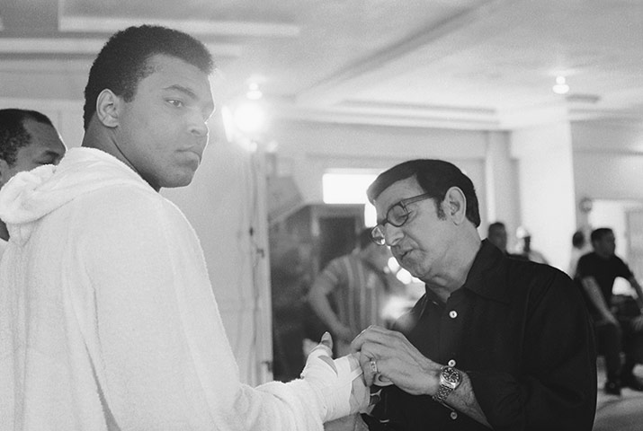 Angelo Dundee: Angelo Dundee helps Muhammad Ali with his hand bindings