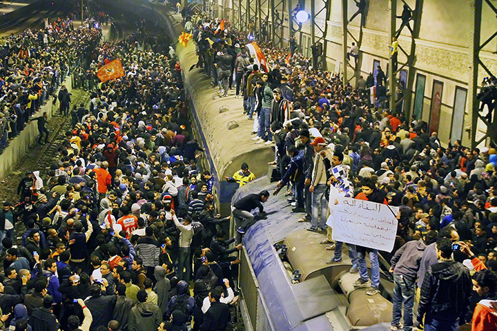 Port Said clashes: Crowds at train station waiting for people to arrive from Port Said