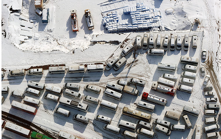 Europe weather: Cars, trucks and buses seen in snow-blanketed Istanbul, Turkey