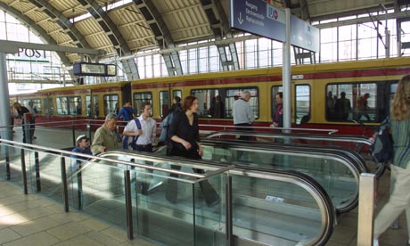 Passengers board a train in Berlin, Germany