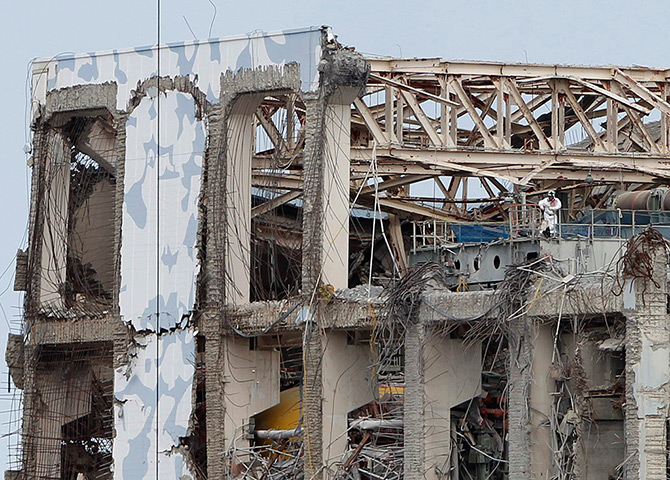 inside Fukushima: a worker on the roof of the No.4 reactor building