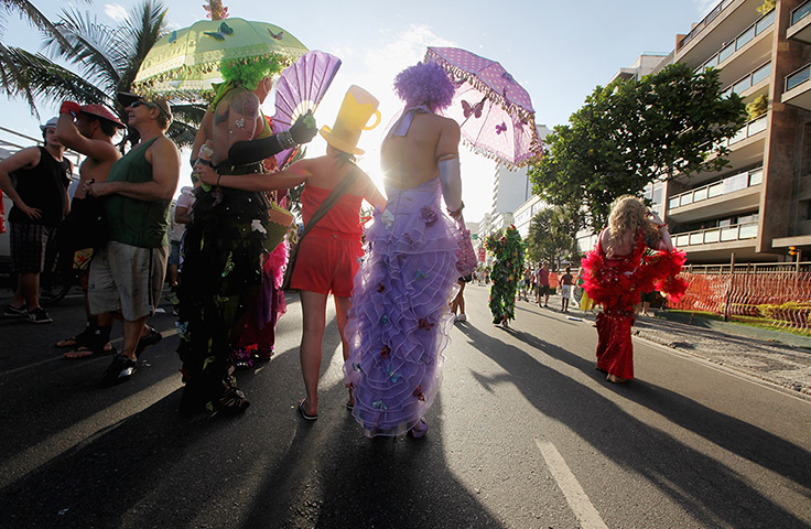 Rio Carnival: Revelers parade during Carnival celebrations along Ipanema beach