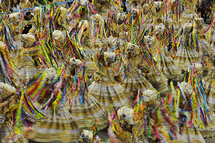 Rio Carnival: Revellers of the Beija Flor samba school perform at the Sambadrome