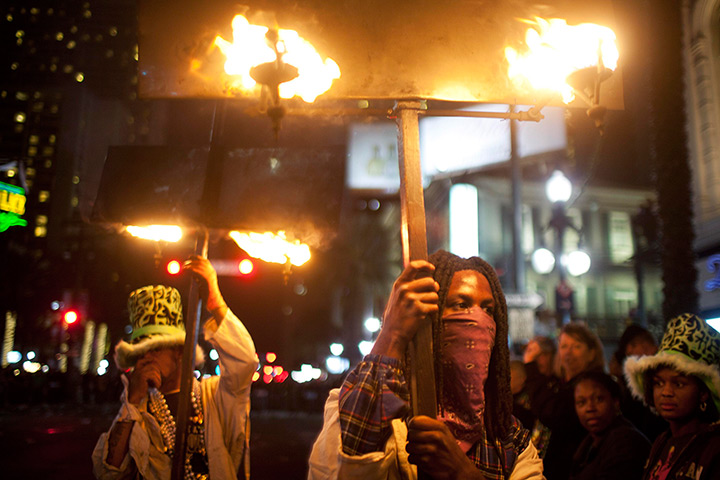 Mardi Gras: Flambeaus, or flame bearers