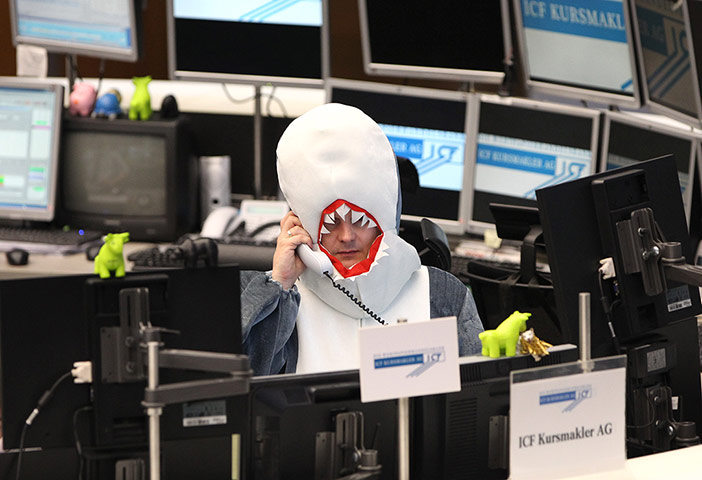Frankfurt stock exchange: broker dressed as shark