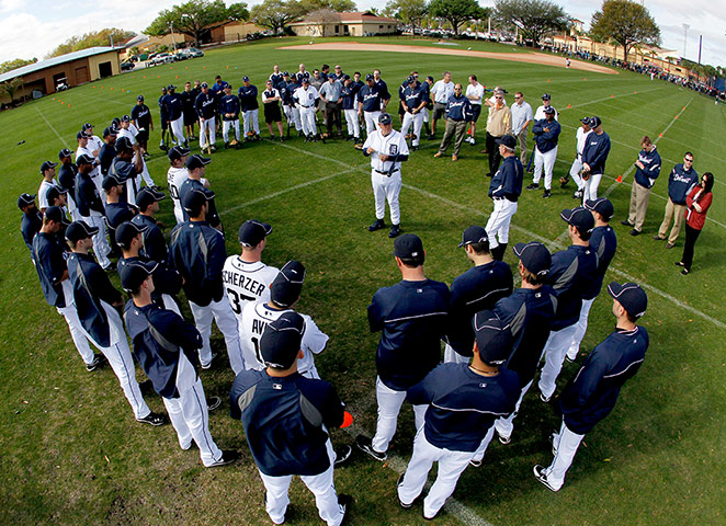 MLB spring training: The Detroit Tigers meet on the practice field in Lakeland, Florida