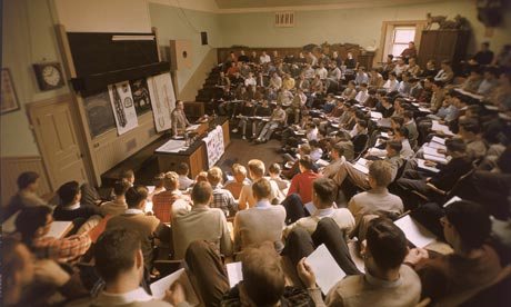 Students take notes at lecture