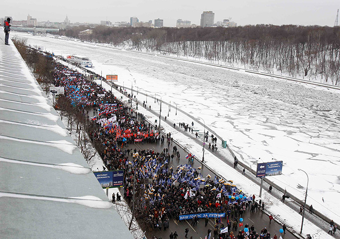 Putin presidential rally: People take part in a procession to support presidential candidate Putin