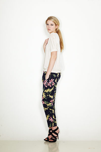 Key Fashion Trends: Model wearing Wisteria print trousers and lace tp
