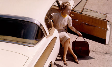 Woman in 1958 Packard Hawk car