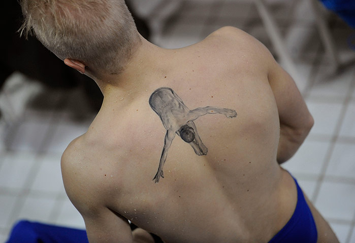 Diving Thursday: Swedish Diver with a tattoo at the FINA Diving world cup